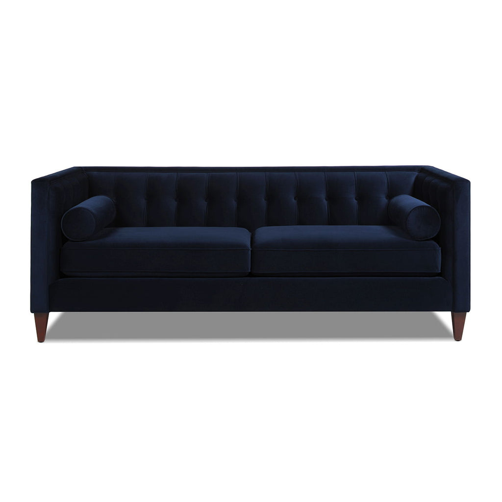 Minimalist 84-inch sofa from the Cadence collection featuring a crisp tuxedo silhouette and tapered accent legs in dark navy . Front facing on White background.