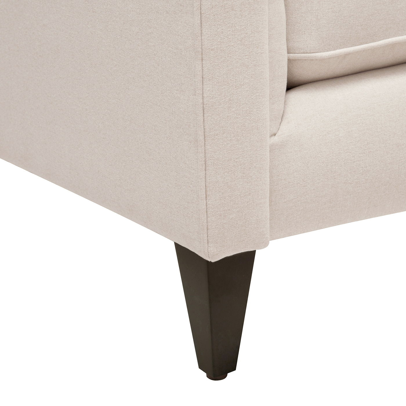 Minimalist 84-inch sofa from the Cadence collection featuring a crisp tuxedo silhouette and tapered accent legs in sky neutral beige. Leg Detail.