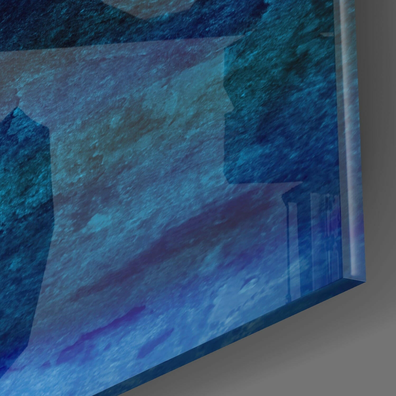 Close-up corner detail of tempered glass wall art showing glossy texture and mounting edge