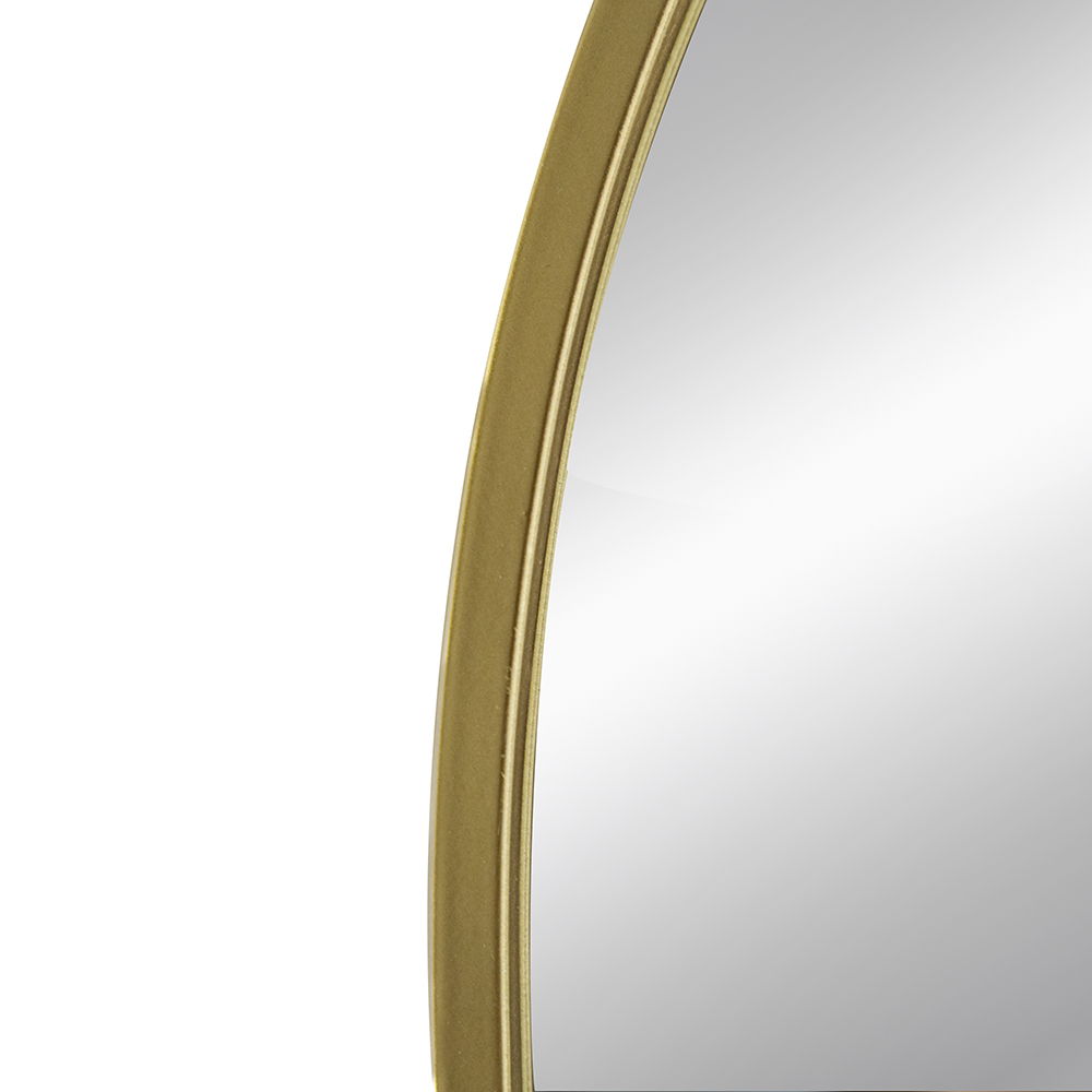 Side profile detail of the Ondine Mirror's slim brushed gold arch and glass edge