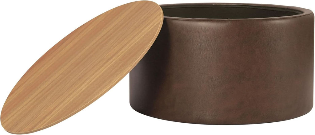 Studio view of the Element storage ottoman with its solid wood lid propped open, revealing the spacious, lined hidden internal storage compartment inside the brown upholstered drum frame.