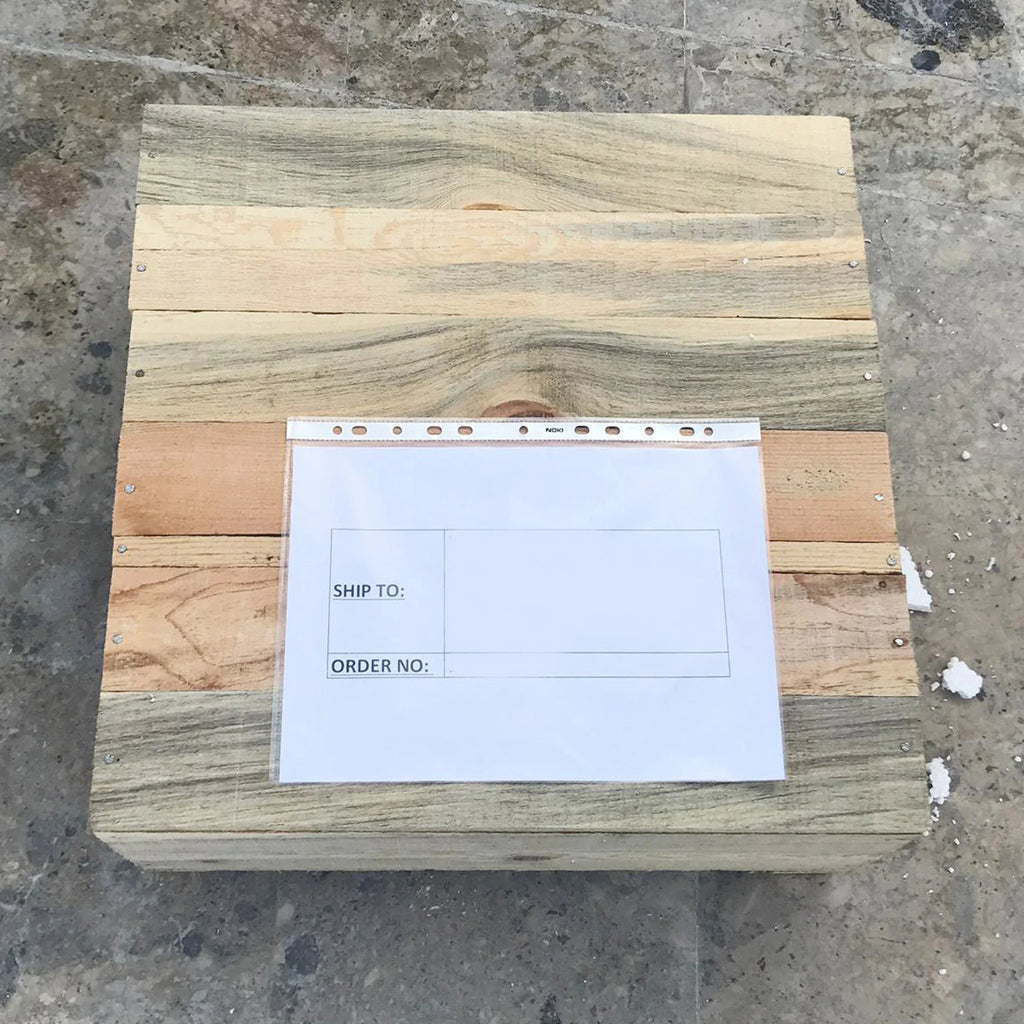 Fontaine Side Table packaged in a reinforced wooden shipping crate to prevent transit damage