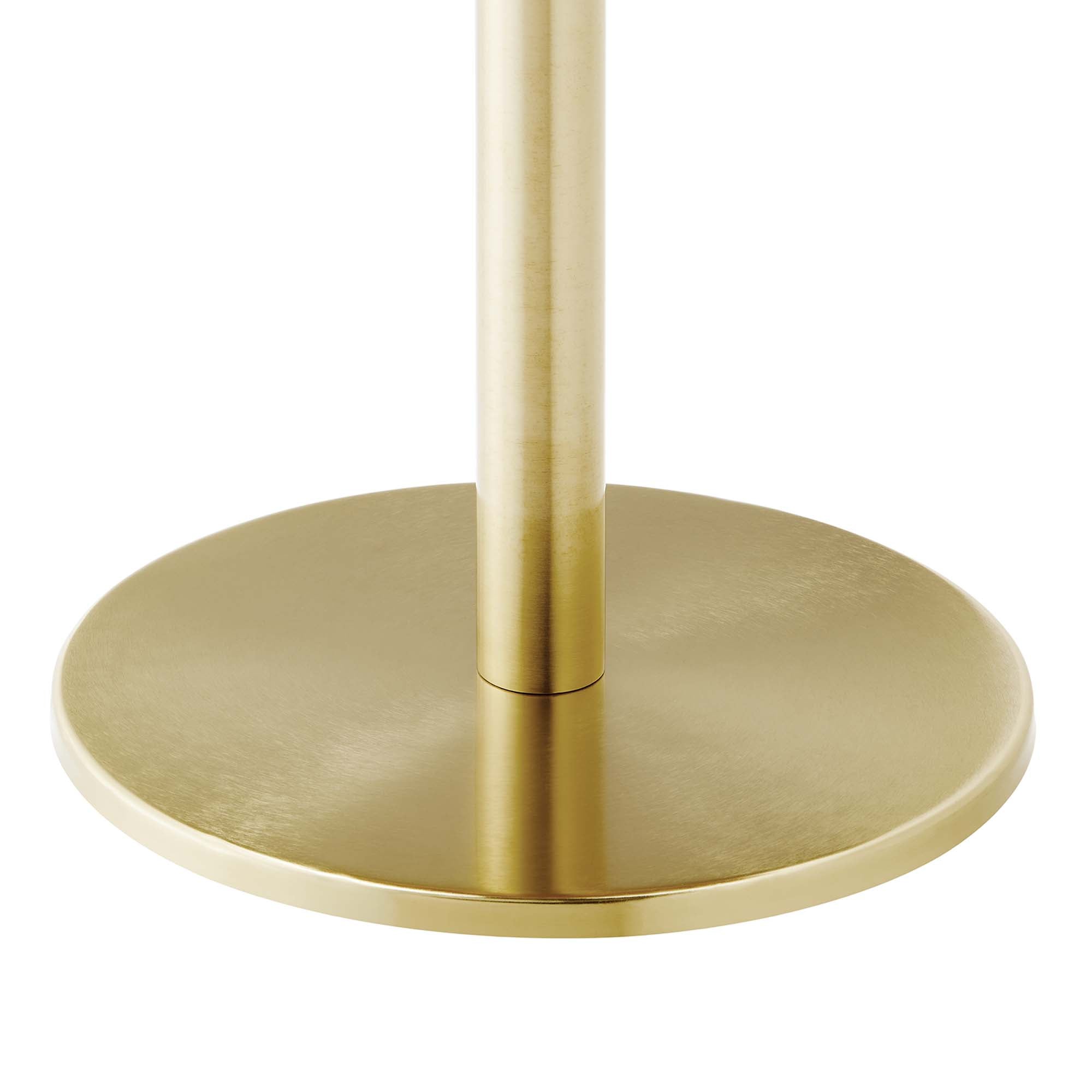 Close-up of the brushed gold pedestal column and round base of the Perrine Side Table