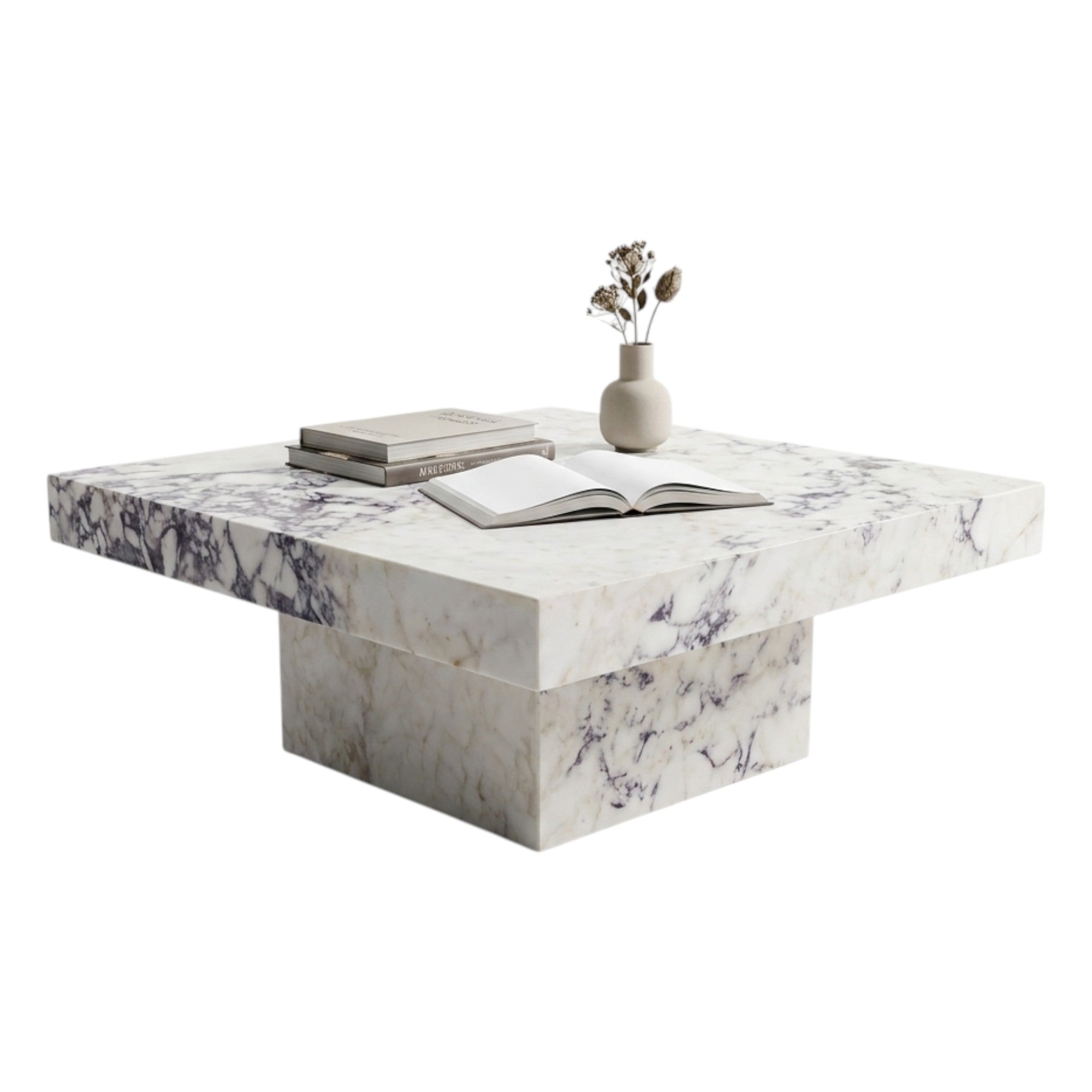 Square marble coffee table with burgundy veining, styled with books and vase