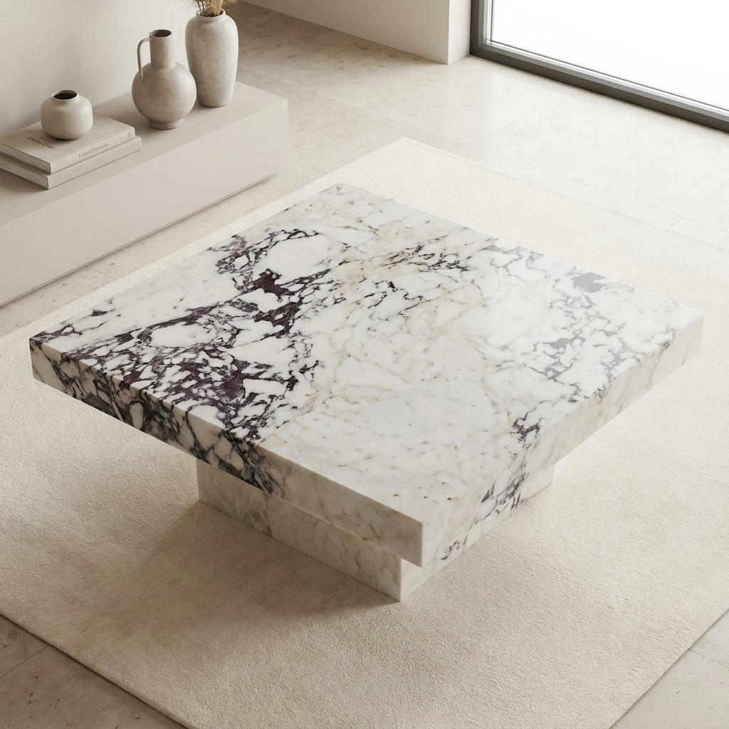 Overhead angle of marble coffee table showing burgundy vein pattern