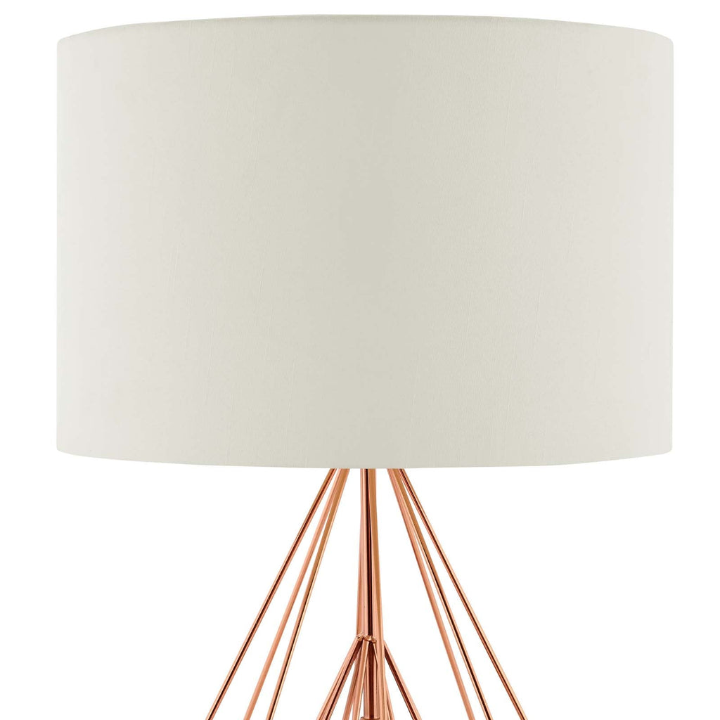 Close-up of cream drum shade meeting rose gold wire diamond base