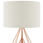 Close-up of cream drum shade meeting rose gold wire diamond base