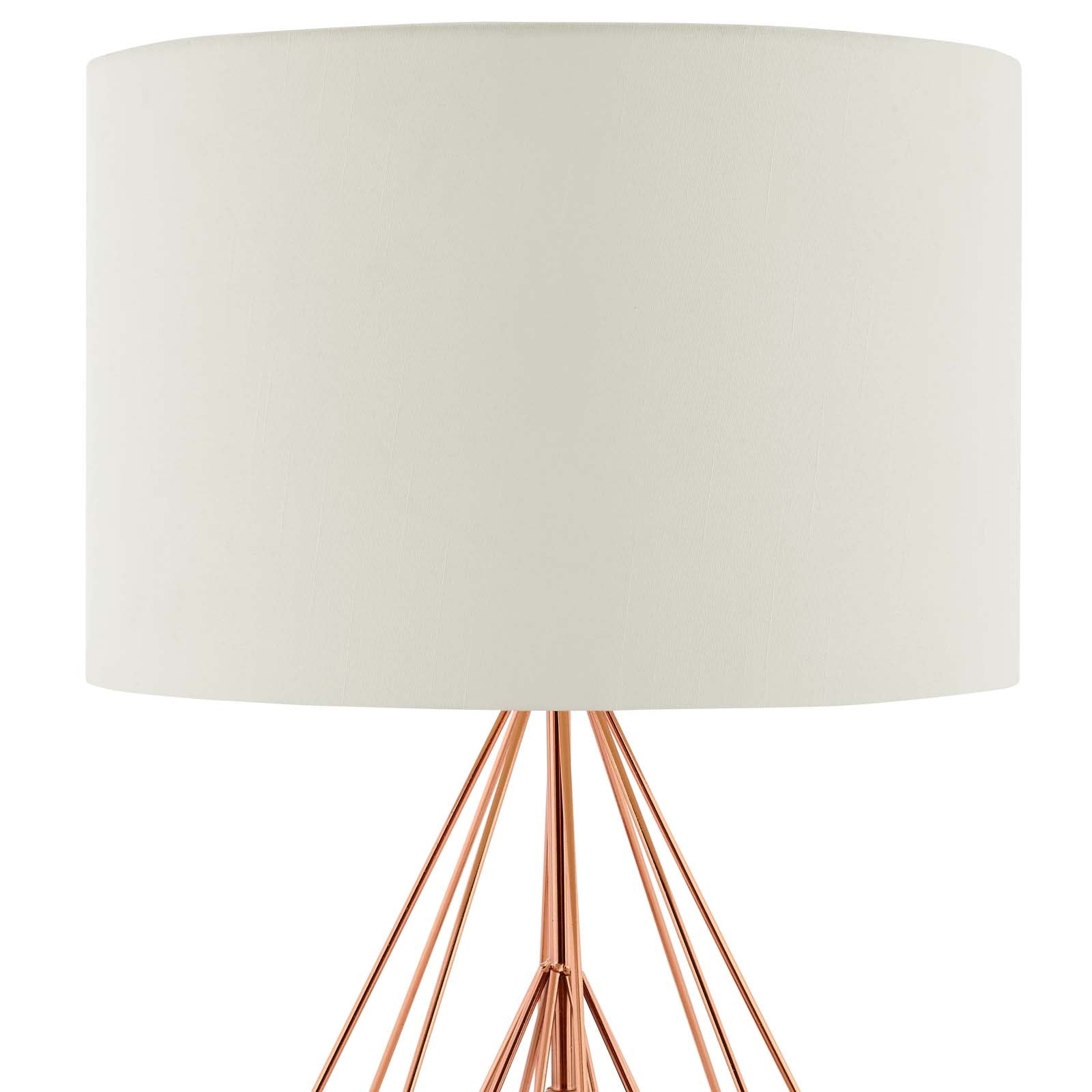 Close-up of cream drum shade meeting rose gold wire diamond base