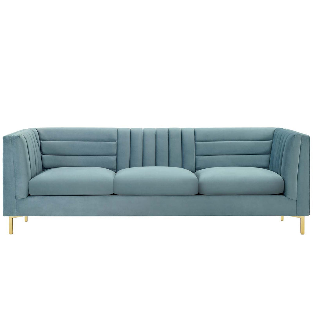 Light blue channel-tufted velvet sofa with brushed gold legs, shown straight-on