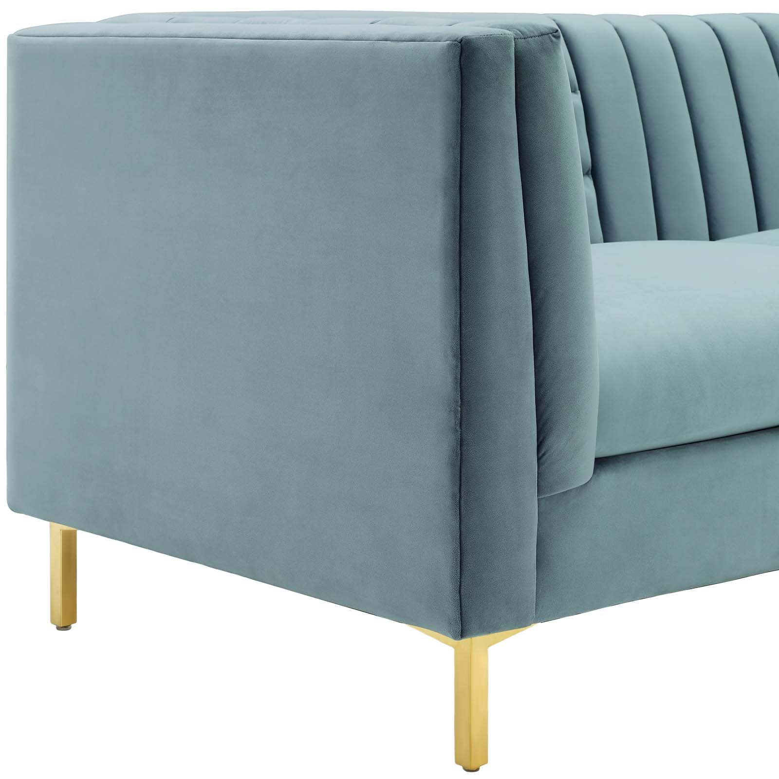 Close-up of the brushed gold leg and corner detail on the Roxane Sofa