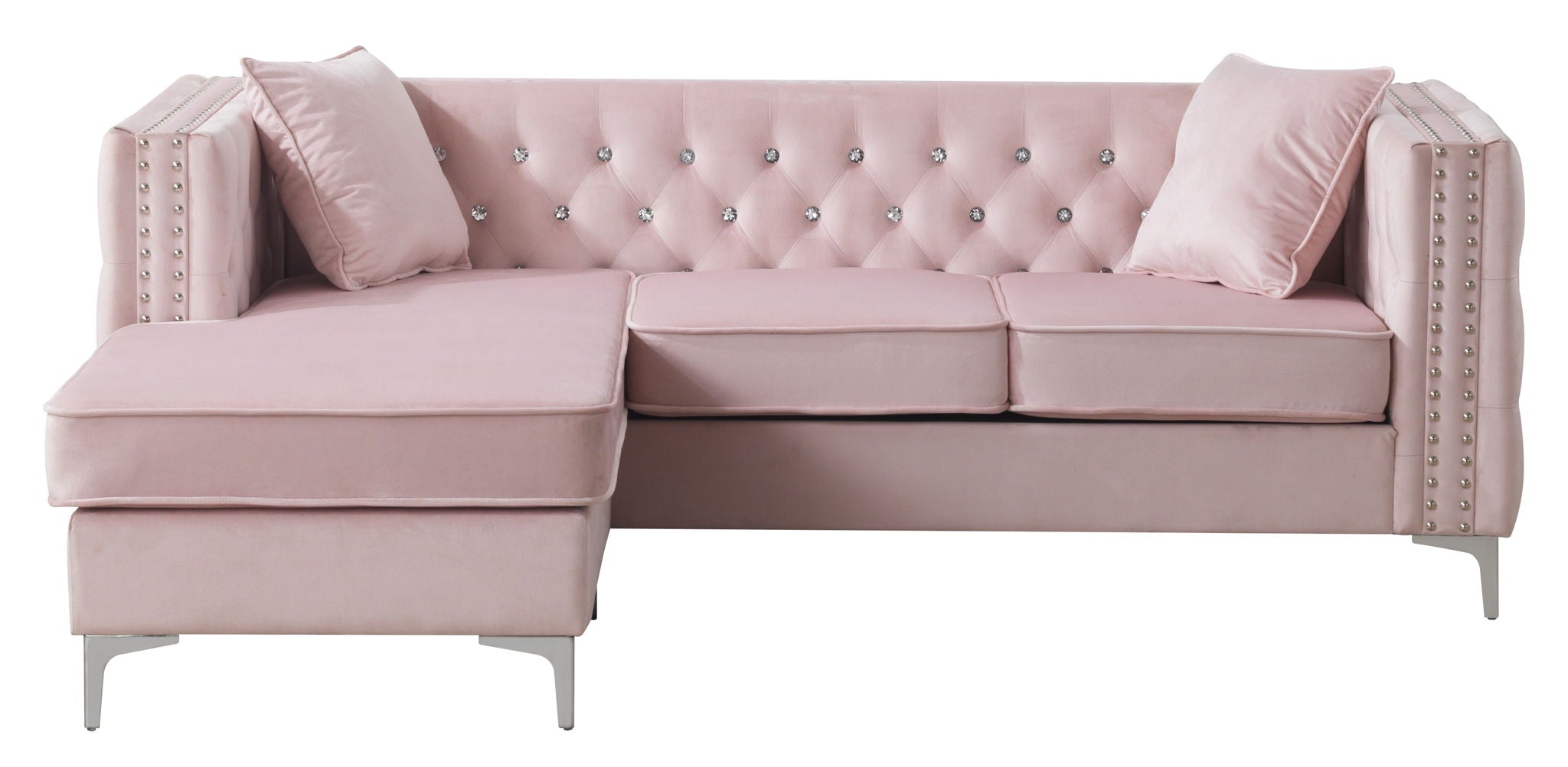 Blush pink velvet sofa chaise shown at a front angle showing the reversible chaise configuration