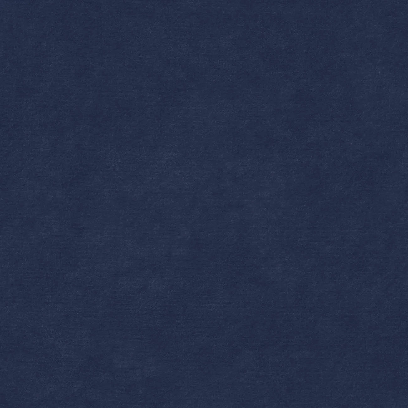 Close-up of the deep navy performance velvet fabric texture on the Simone Sectional