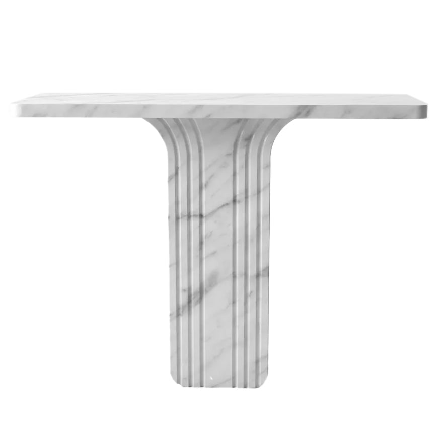Front view of white marble console table showing fluted single-column pedestal base