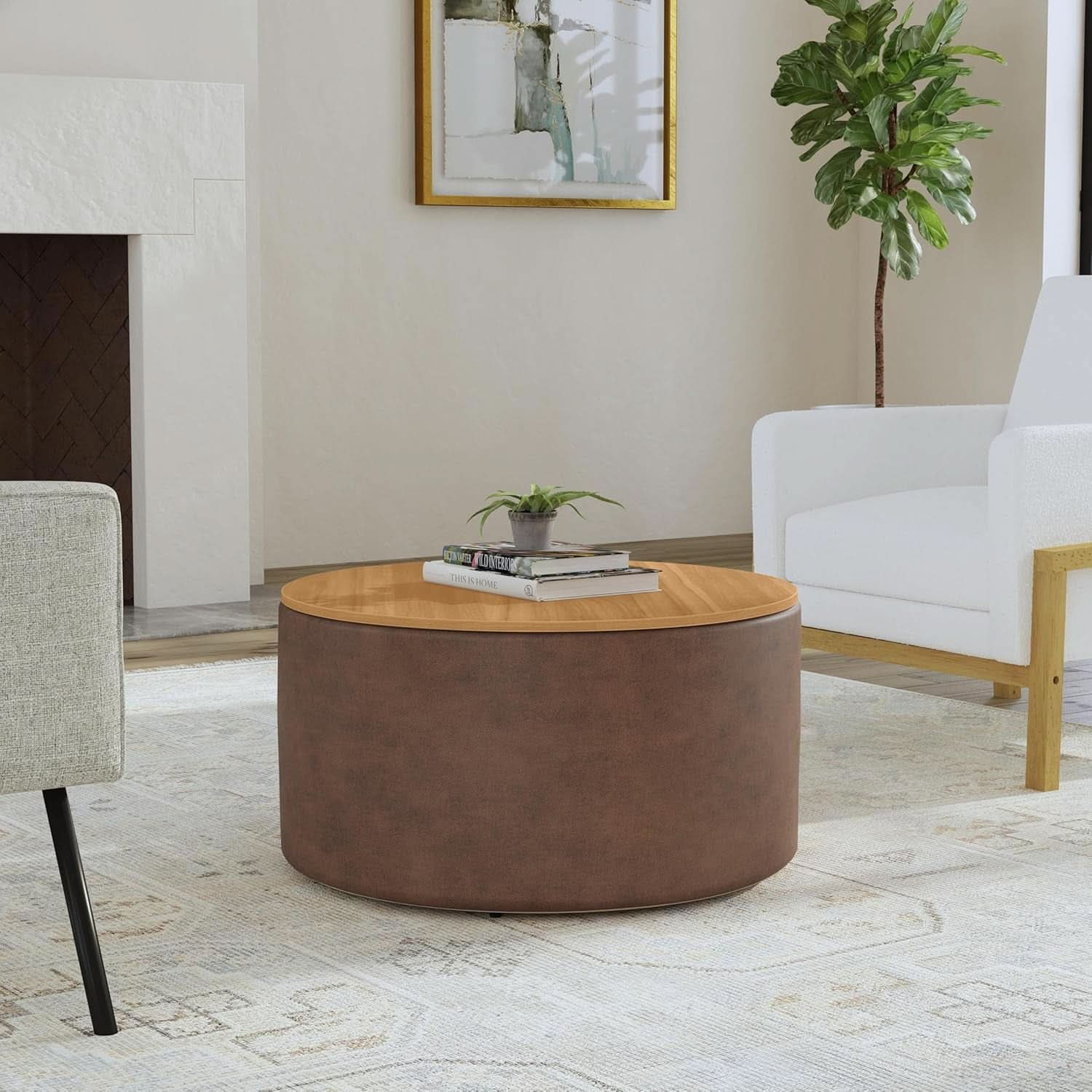 Editorial three-quarter view of the Element storage ottoman styled in a bright, modern living room on a neutral patterned rug, flanked by low-profile accent chairs.