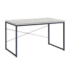 Weathered oak writing desk with open black iron X-brace frame on a white background