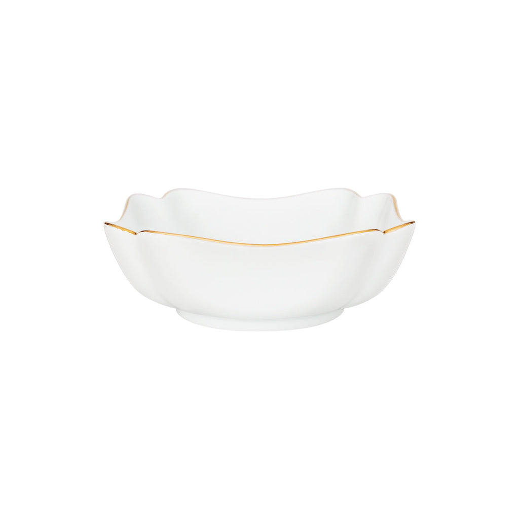 Square porcelain bowl with soft scalloped corners and a fine gold rim, shown against a white background