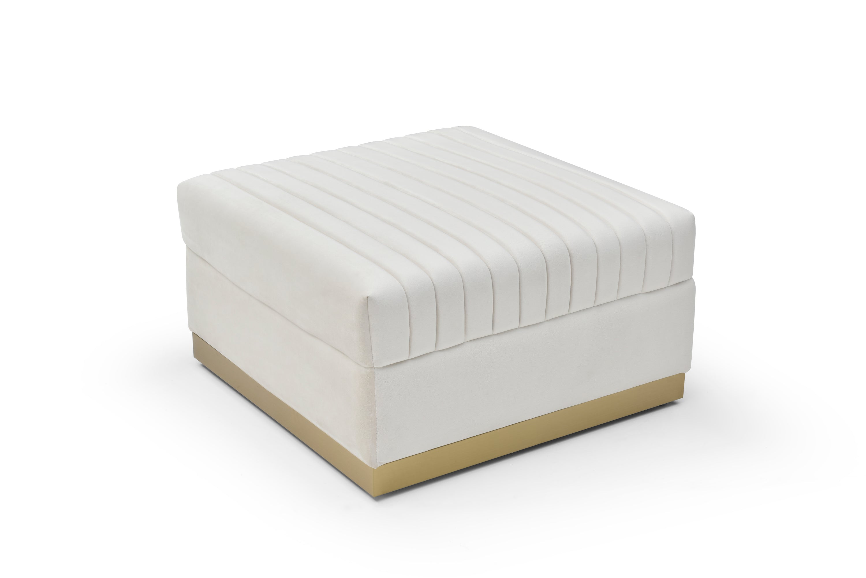 Studio profile view of the closed cream velvet ottoman highlighting its crisp square geometry and deep channel tufted top surface.