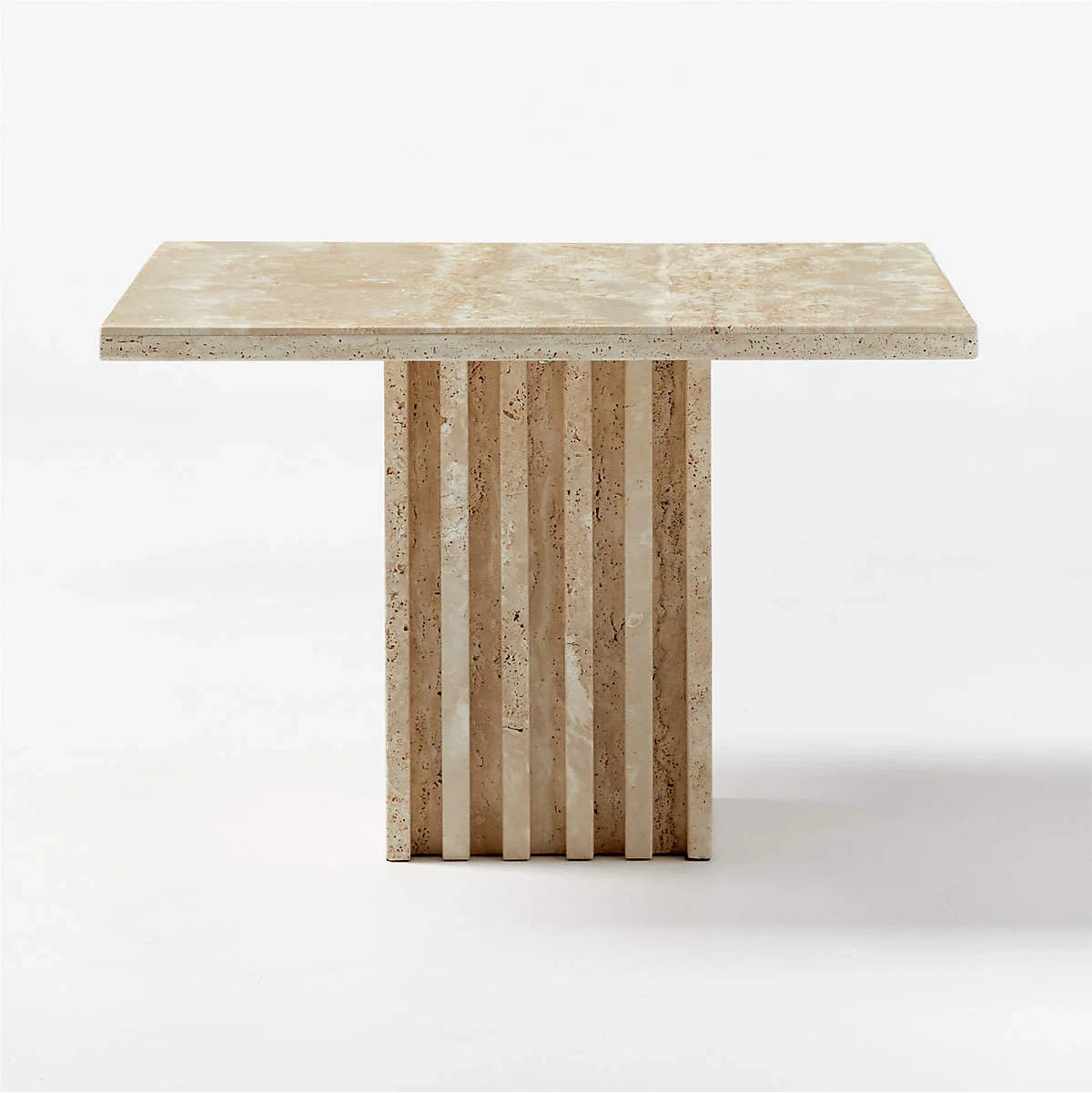 Honed travertine side table with fluted column base shown from a front angle on a white background
