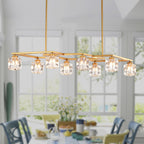 Matte gold geometric chandelier with crystal light cubes illuminated over a dining table