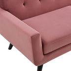 Close-up of tufted button backrest and seam detail on the Camille Armchair in dusty rose velvet