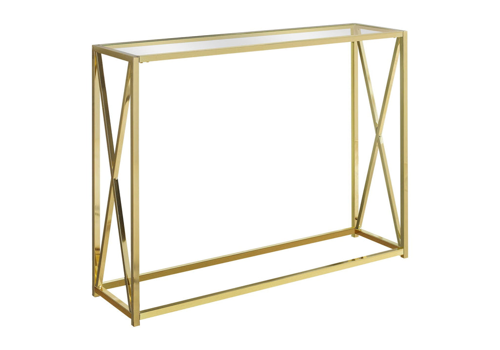 Gold metal console table with crossed X-frame base and glass top, shown against a white background