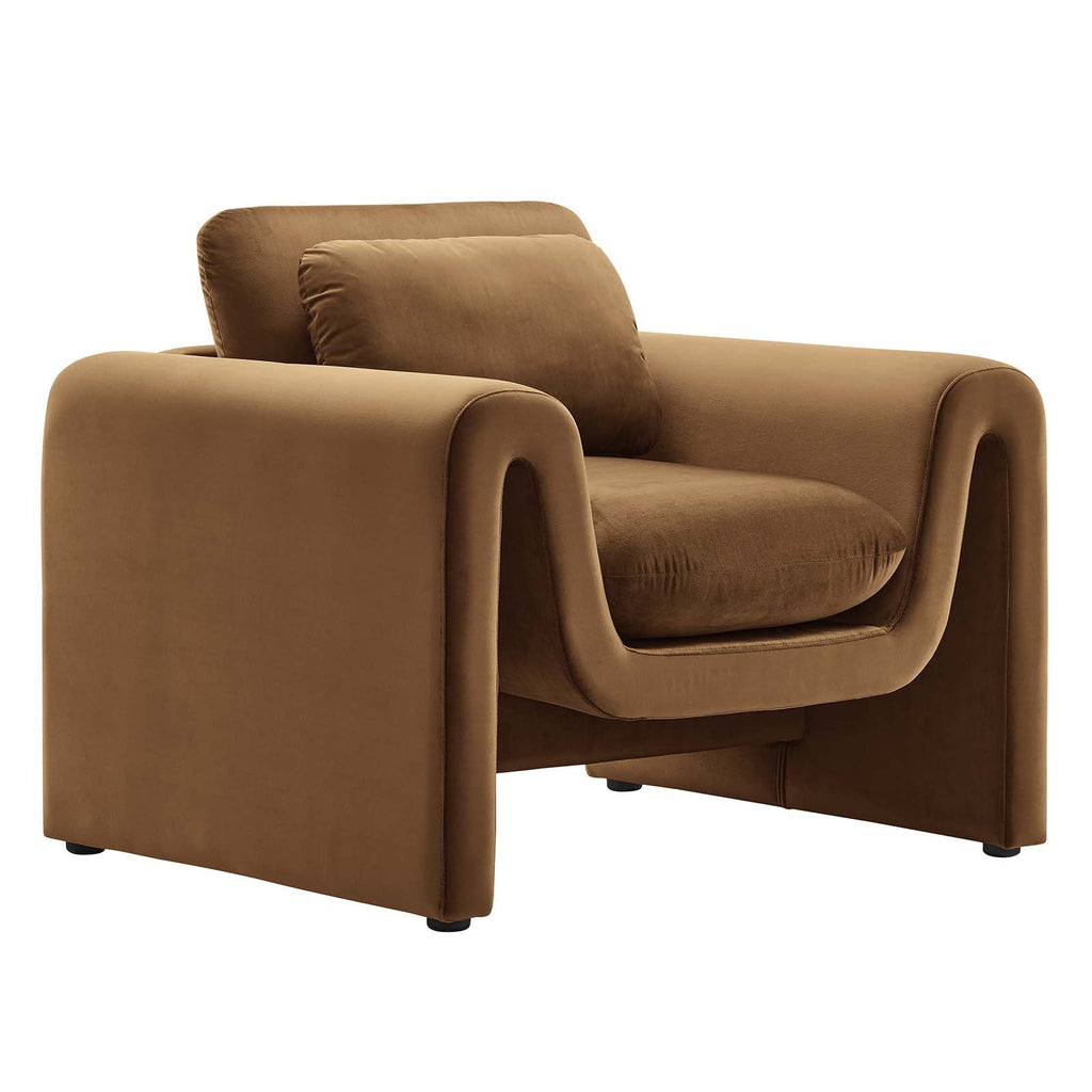  Cognac velvet armchair with continuous curved arms on a white background