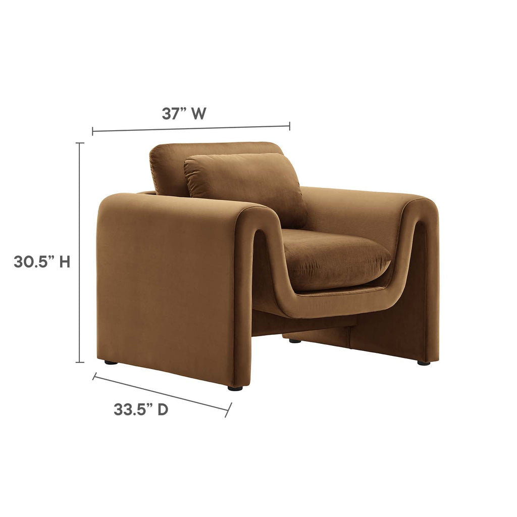 Diagram highlighting the Odile Armchair's stain-resistant velvet, dense foam padding, and adjustable foot pads