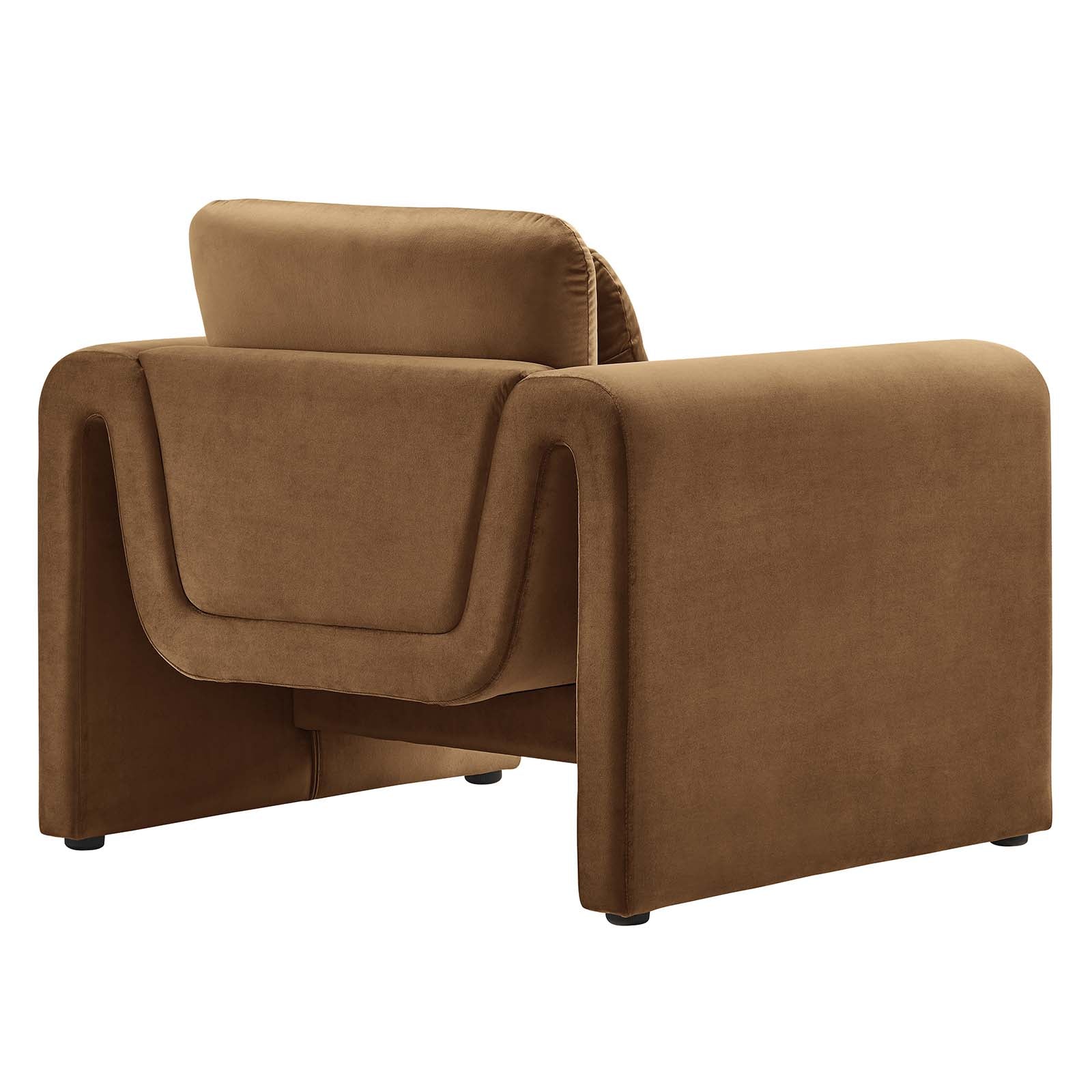 Rear three-quarter view of the cognac velvet Odile Armchair showing its continuous curved frame