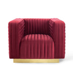 Symmetrical front orthographic view of the architectural maroon velvet Rubis Bloc Armchair showcasing its crisp tuxedo frame and recessed gold base.