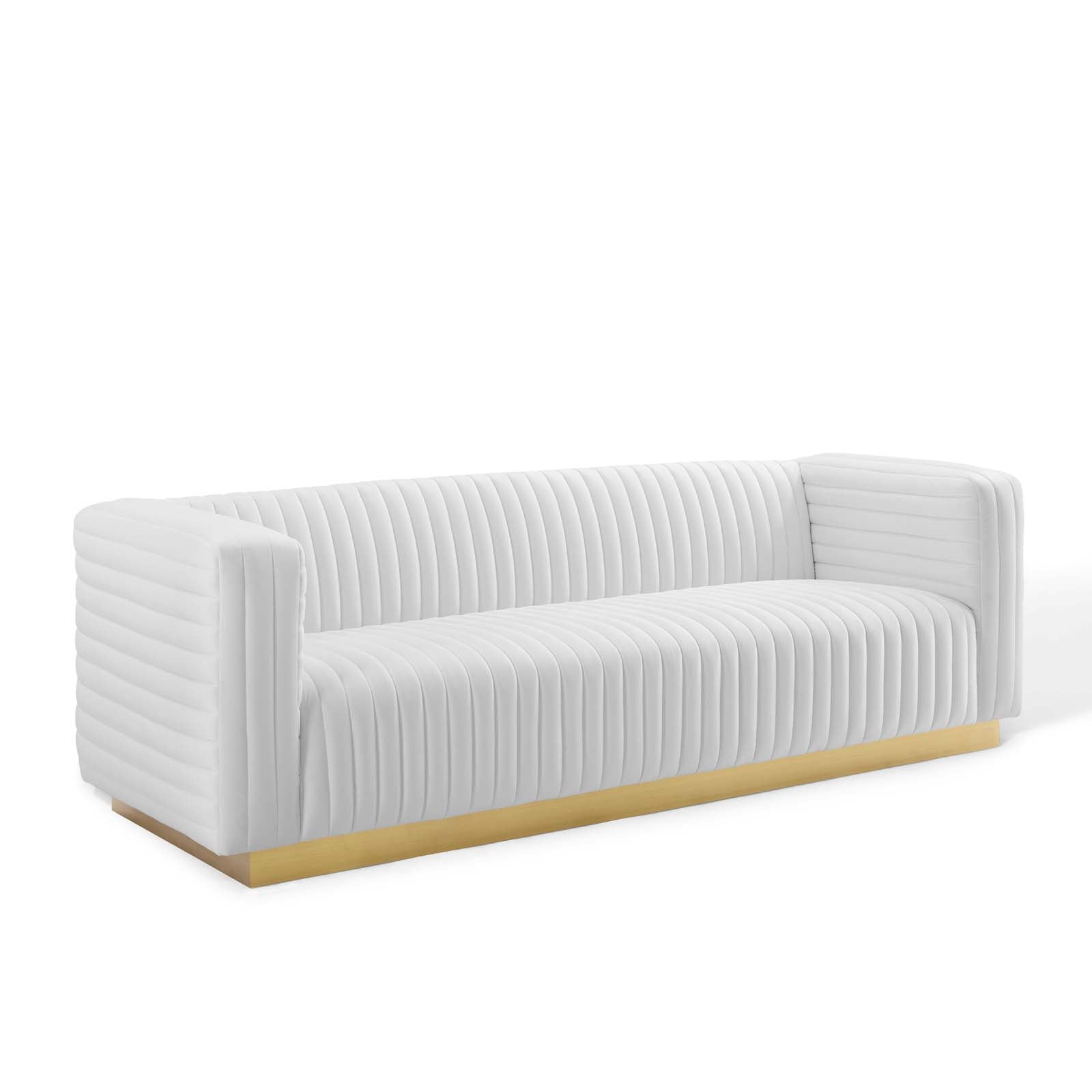 Ivory channel-tufted velvet sofa with continuous vertical ridges and solid gold base