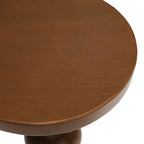 Close-up of the round walnut tabletop surface on the Valentine Drinks Table
