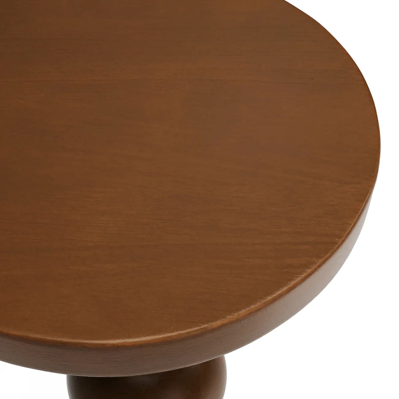 Close-up of the round walnut tabletop surface on the Valentine Drinks Table