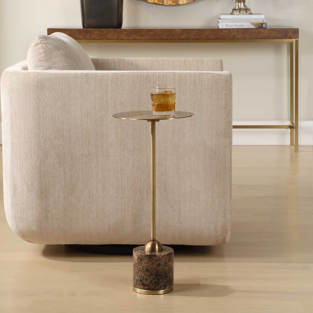 The Isabeau Drink Table beside a curved upholstered chair