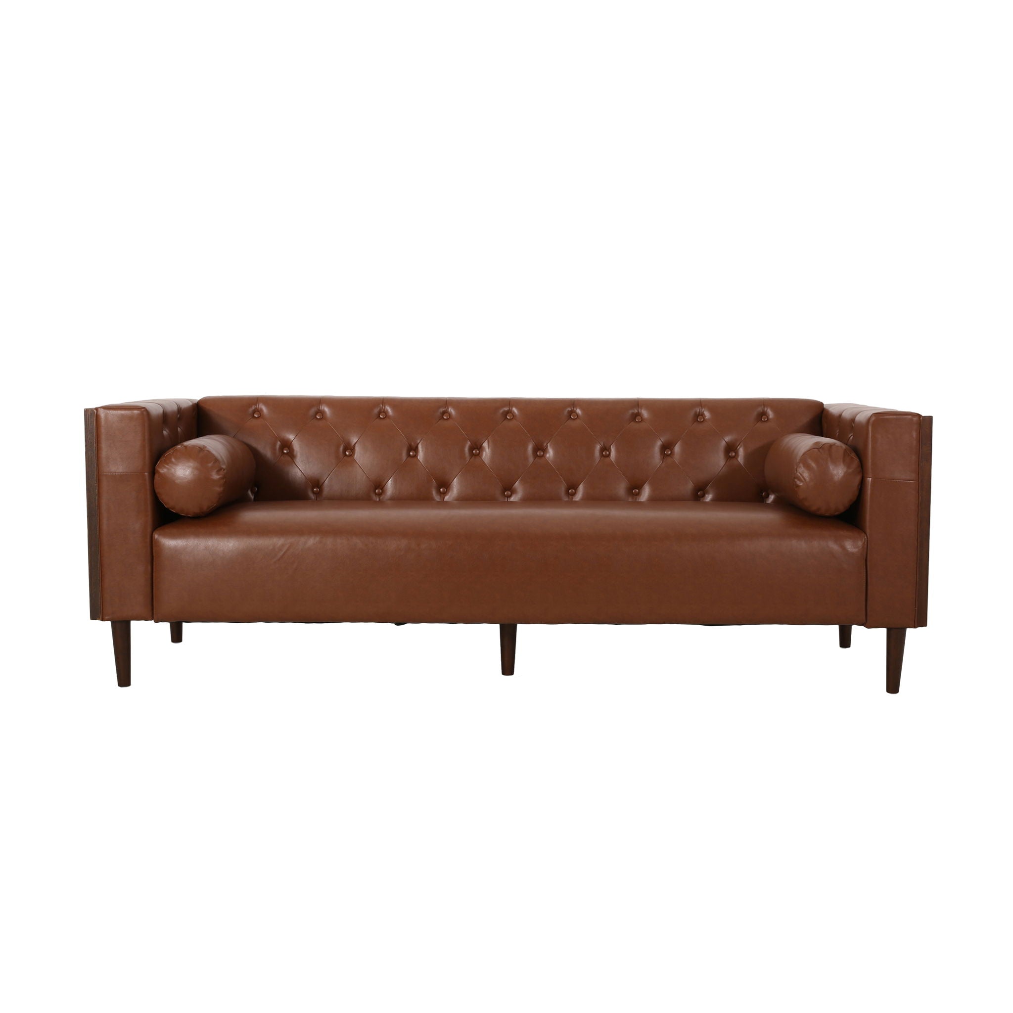 Symmetrical straight-on studio profile of the Monolith 90-inch tuxedo sofa in caramel leather, demonstrating the flat bench seat cushion and clean lower frame line against a plain backdrop.