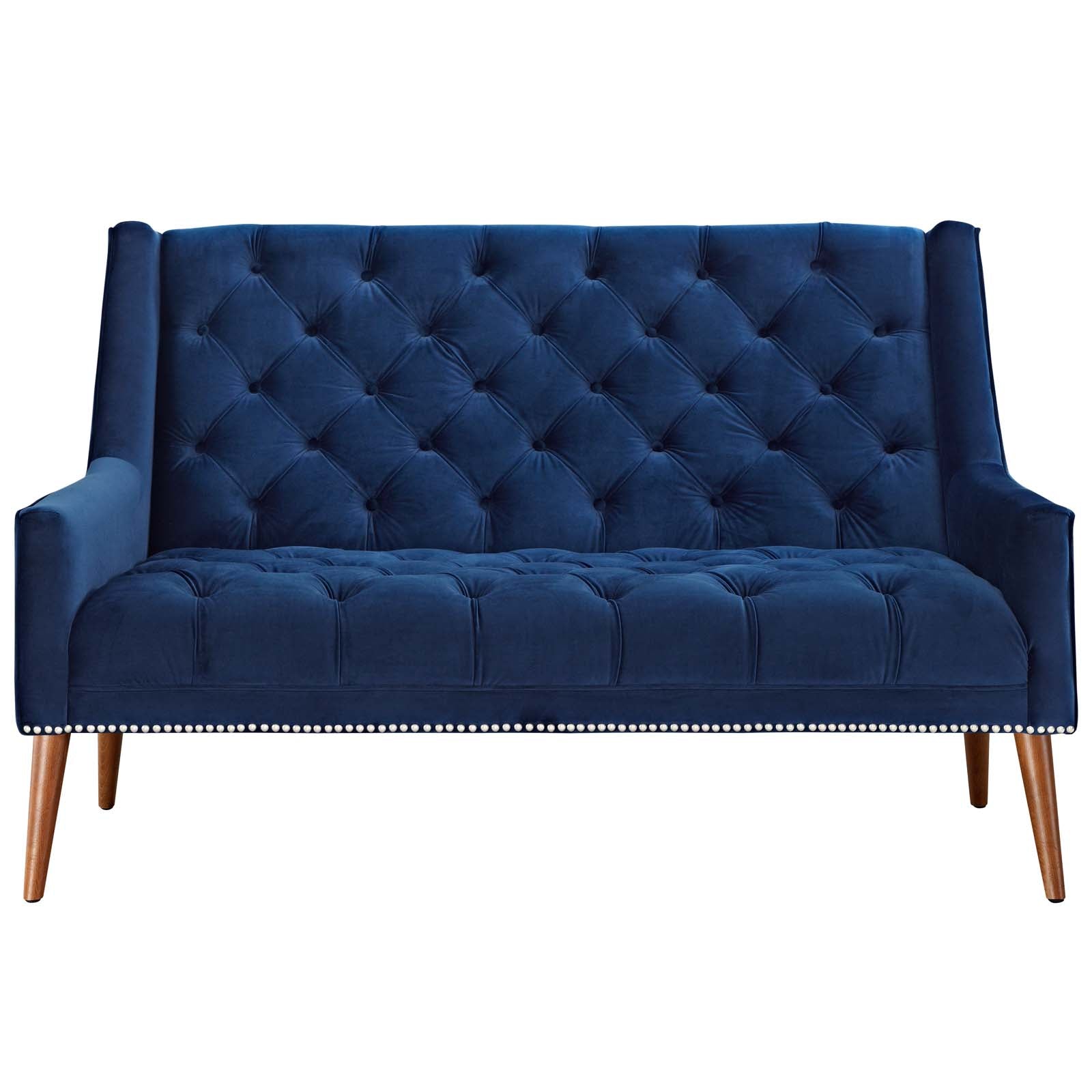 Symmetrical straight-on studio shot of the Peruse navy blue velvet loveseat, highlighting the uniform button tufting on the seat cushion and the lower row of antique nickel nailhead trim.