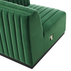 Close-up technical view of the interior seam of the Velvet Rogue velvet chair module, showcasing the heavy-duty alligator-style interlocking metal bracket used to connect the sectional frames safely.